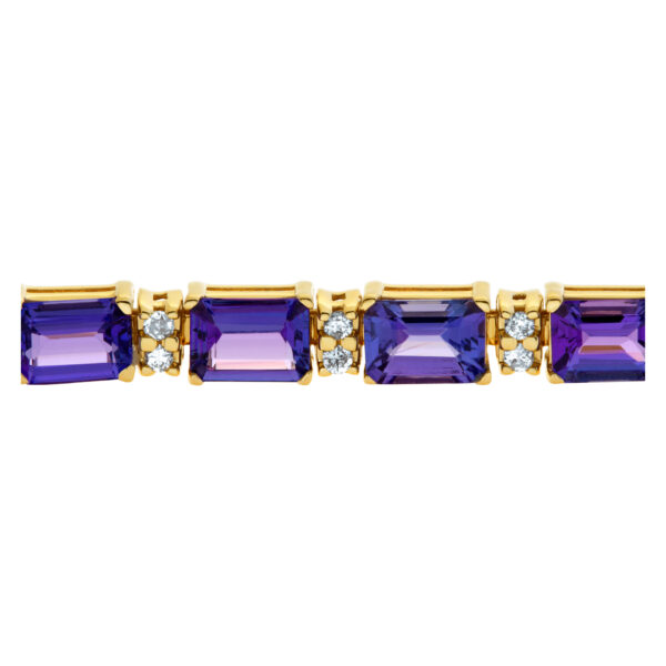 14k bracelet with 16.8 cts in tanzenite and .8 carats in diamonds