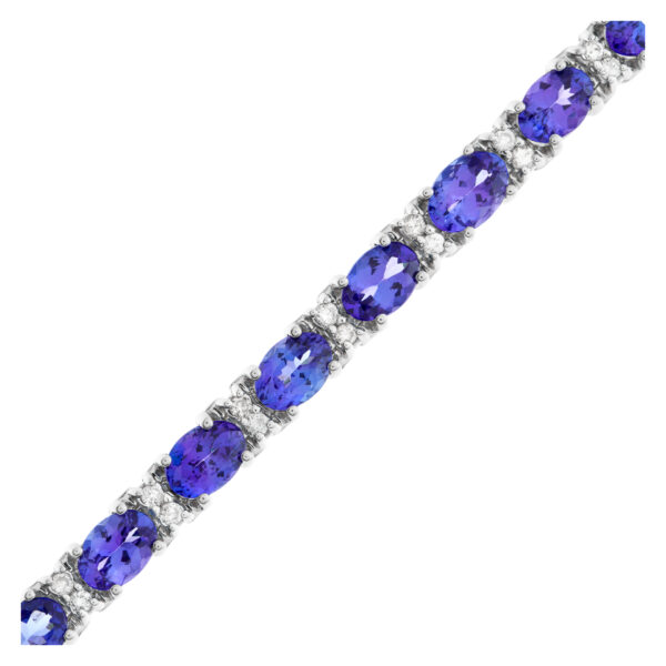 Line bracelet with oval tanzanite and round diamonds in 14k white gold