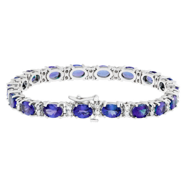 Line bracelet with oval tanzanite and round diamonds in 14k white gold