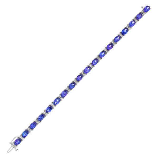 Line bracelet with oval tanzanite and round diamonds in 14k white gold