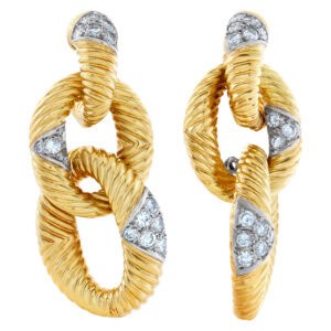 Beautiful earrings in 18k with 1 carat in diamonds