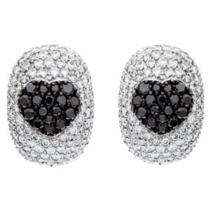 Pave diamond heart design black and white diamond earrings in 18k white gold. Approx. 1.40 carats total weight