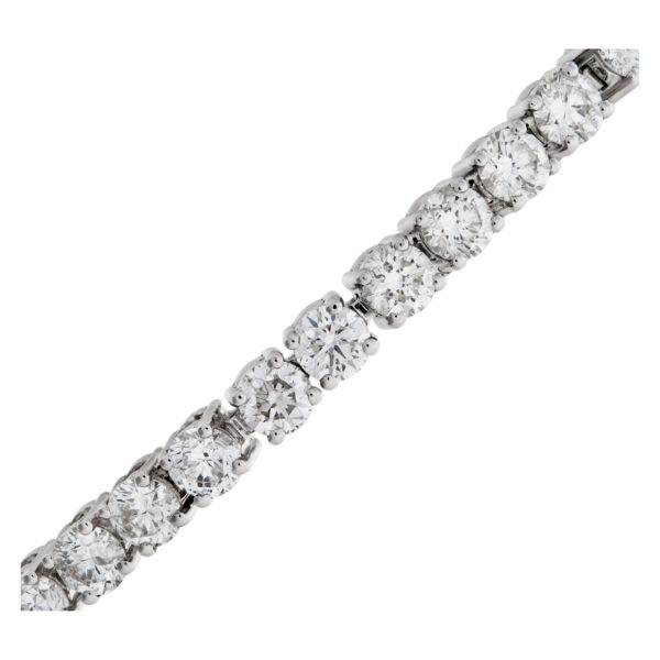 Sparkling line diamonds bracelet with over 5 carats full cut round brilliant diamonds set in 18k white gold.