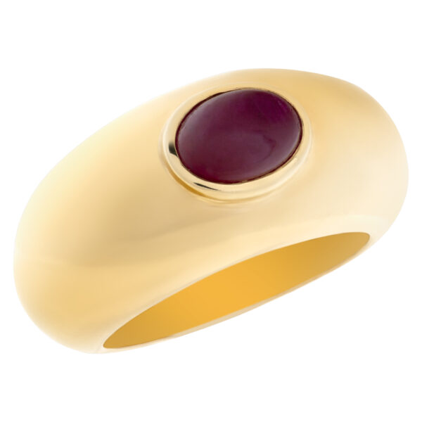 Designer signed "T" cabochon ruby set in 18 Kt yellow "Gipsy" ring style. Size 7.25.