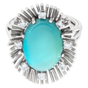 Elegant turquoise and diamond ring in 18k white gold.