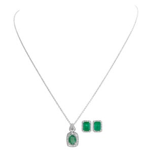 Diamond necklace and earrings with emeralds set in 14k white gold