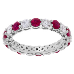 Diamond and ruby eternity band in 18k white gold