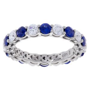 Diamond and blue sapphire eternity band in 18k white gold