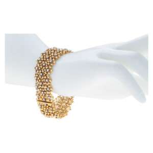 Piranesi bracelet in 18k yellow gold with diamonds