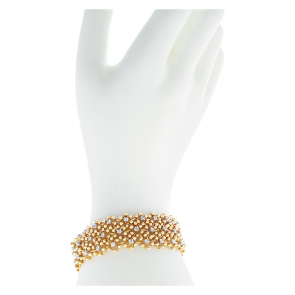 Piranesi bracelet in 18k yellow gold with diamonds