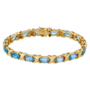 Beautiful "X" Topaz bracelet in 14k yellow gold