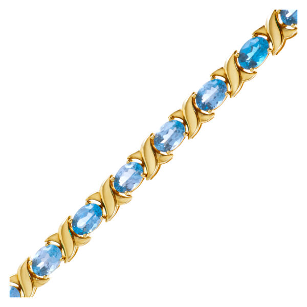 Beautiful "X" Topaz bracelet in 14k yellow gold