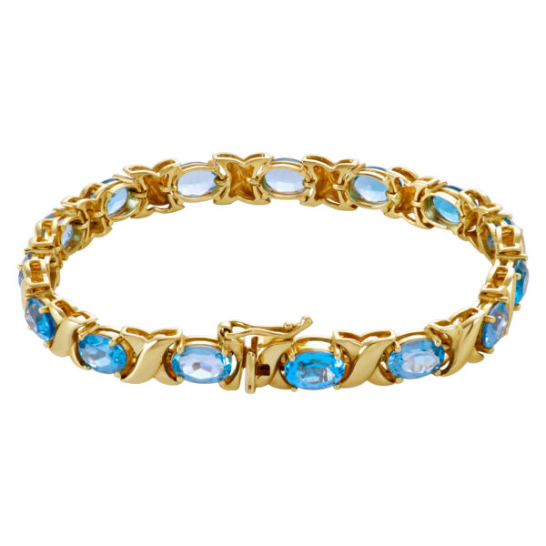 Beautiful "X" Topaz bracelet in 14k yellow gold