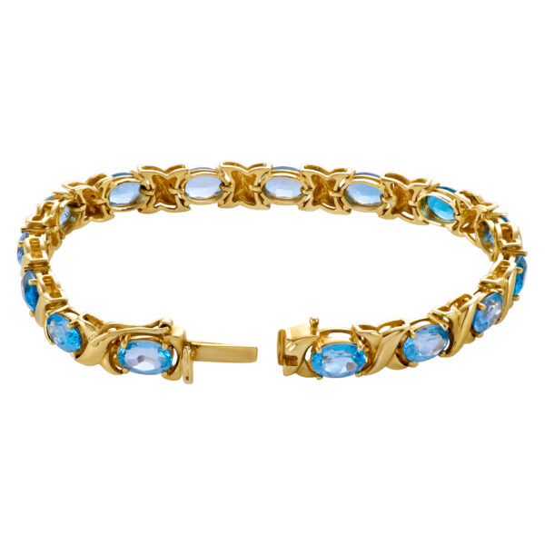 Beautiful "X" Topaz bracelet in 14k yellow gold