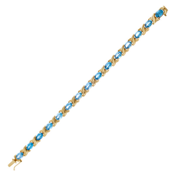 Beautiful "X" Topaz bracelet in 14k yellow gold