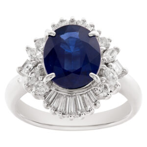 Oval deep blue sapphire and mixed shaped diamonds ring in platinum