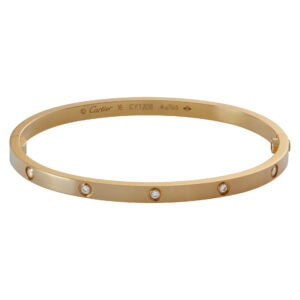 Cartier Love Bracelet small model in 18k yellow gold with 10 diamonds. Size 16.