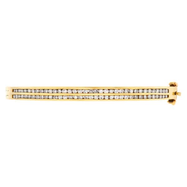 14k yellow gold diamond bangle w/ approx 2 cts in SI diamonds