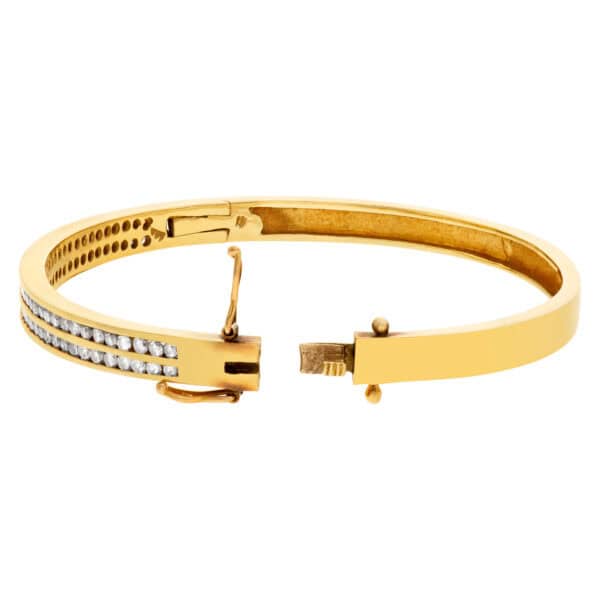 14k yellow gold diamond bangle w/ approx 2 cts in SI diamonds