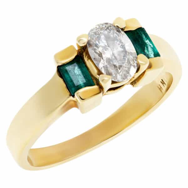 Adorable diamond and emerald ring in 14k. 0.50cts oval diamond (H-I, VS2)