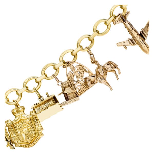 Travel charm bracelet in 14k