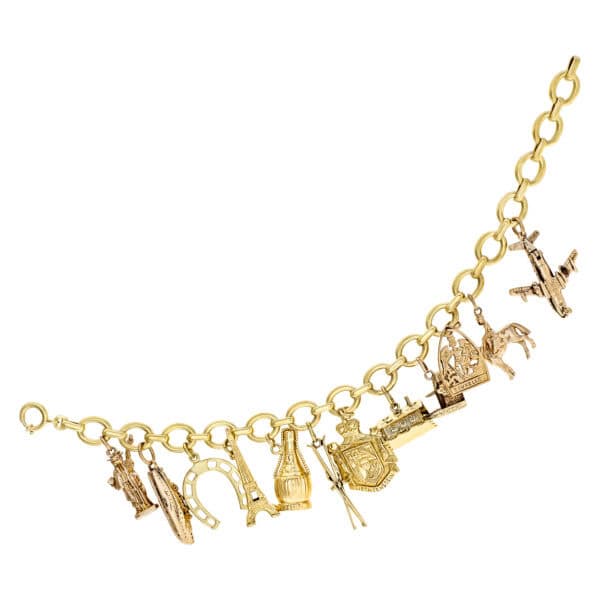 Travel charm bracelet in 14k