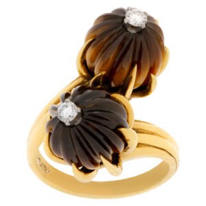 Magnificent tiger eye ring with diamond center in 18k yellow gold. Size 6