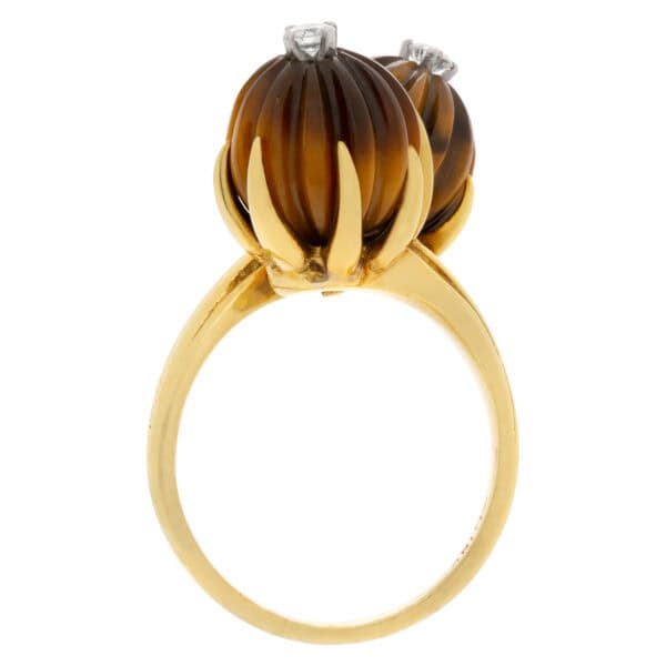 Magnificent tiger eye ring with diamond center in 18k yellow gold. Size 6