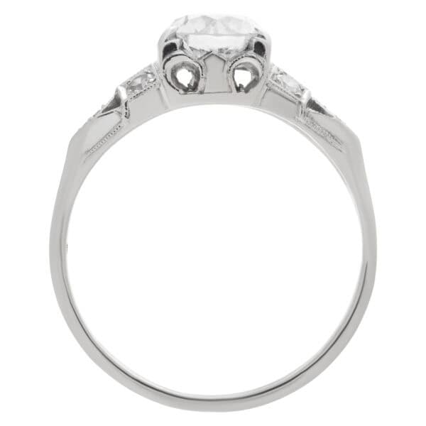 Charming diamond engagement ring in 18k white gold with an app. 0.60 carat center European cut round diamond