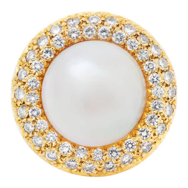 Mabe pearl ring with full cut round brilliant HAlo diamonds set in 14Kt yellow gold