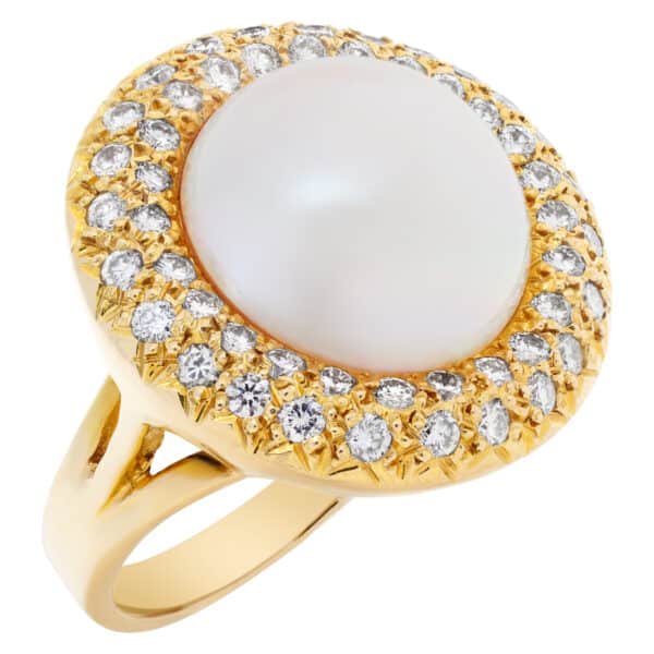 Mabe pearl ring with full cut round brilliant HAlo diamonds set in 14Kt yellow gold