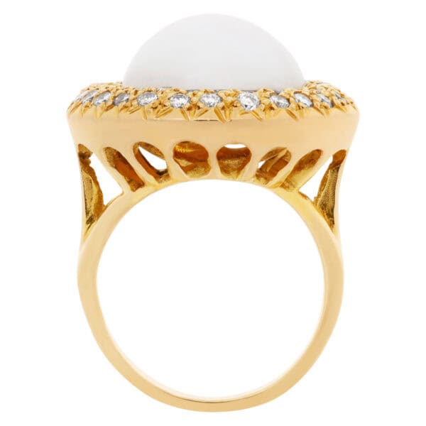 Mabe pearl ring with full cut round brilliant HAlo diamonds set in 14Kt yellow gold