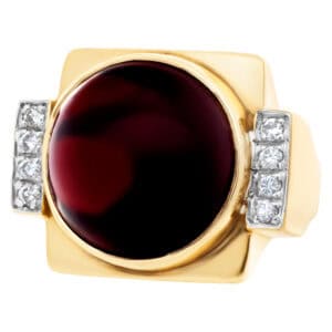 Bold 14k yellow gold ring with cabochon center garnet and accent diamonds