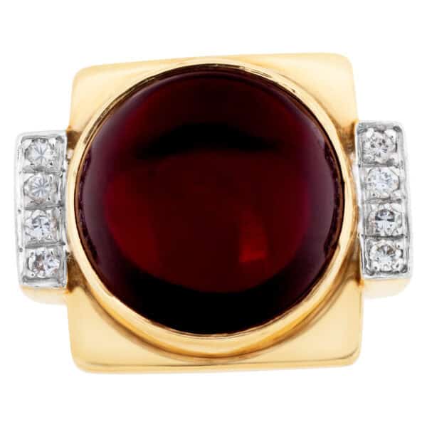 Bold 14k yellow gold ring with cabochon center garnet and accent diamonds