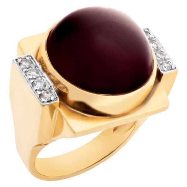 Bold 14k yellow gold ring with cabochon center garnet and accent diamonds